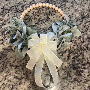 Farmhouse Wood Bead Wreath, adorned with faux Lamb's Ear & Eucalyptus leaves.